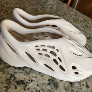 Mens Cream Slip-On Shoes fits like men’s 7.5/8